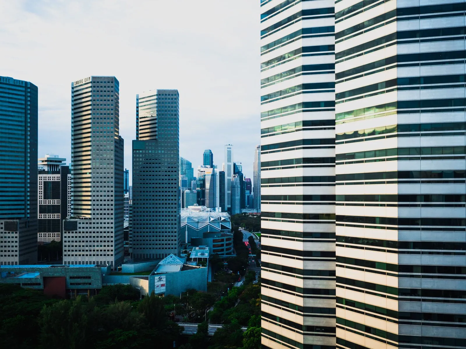 Office towers in Singapore's central business district at first light.